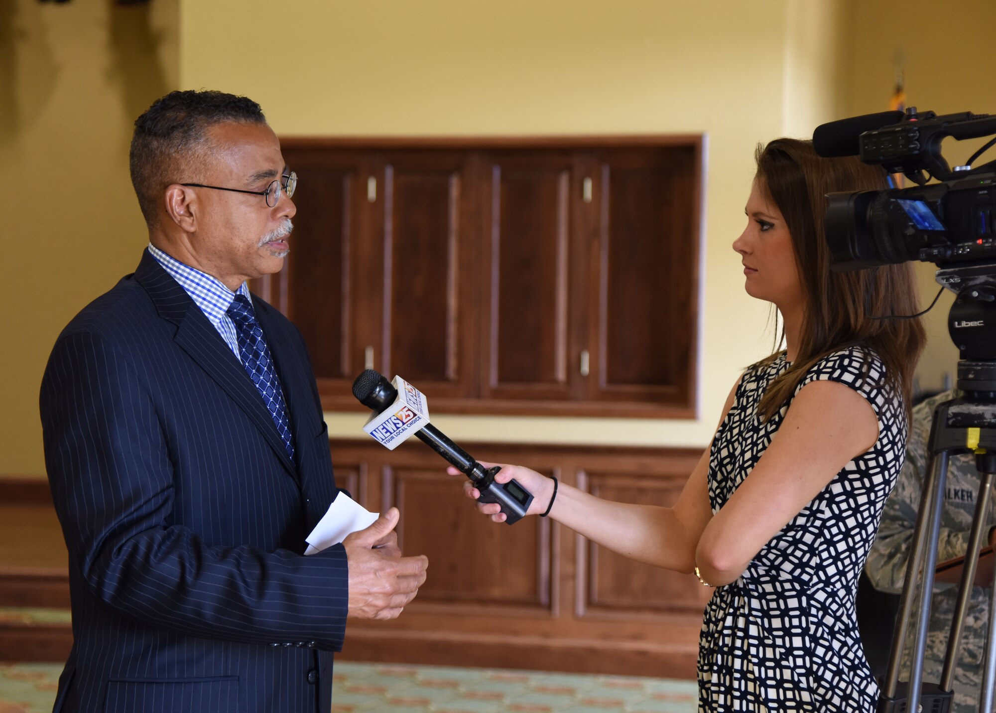 Laurene Callander, WXXV News 25 reporter, interviews Dr. Wayne Clark, 81st Mission Support Group deputy director during the Air Force Community Partnership Program Ideas Workshop at the Bay Breeze Event Center July 27, 2017, on Keesler Air Force Base, Miss. The program administrators are working to leverage military and local community capabilities and resources to achieve mutual value and benefit in support of the Air Force and its business partners. (U.S. Air Force photo by Kemberly Groue)