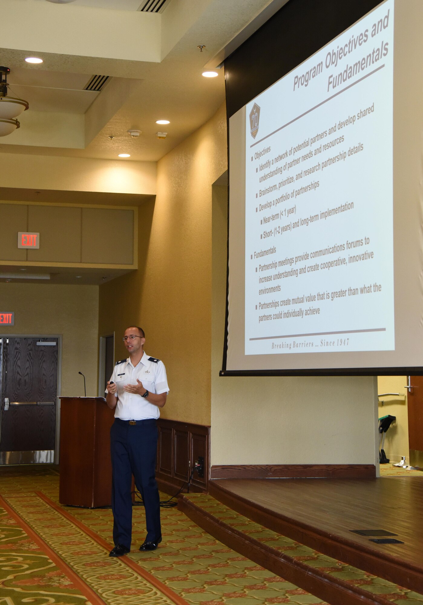 Lt. Col. Chris Miller, Secretary of the Air Force Installations, Environment and Energy partnership broker, delivers remarks during the Air Force Community Partnership Program Ideas Workshop at the Bay Breeze Event Center July 27, 2017, on Keesler Air Force Base, Miss. The program administrators are working to leverage military and local community capabilities and resources to achieve mutual value and benefit in support of the Air Force and its business partners. (U.S. Air Force photo by Kemberly Groue)