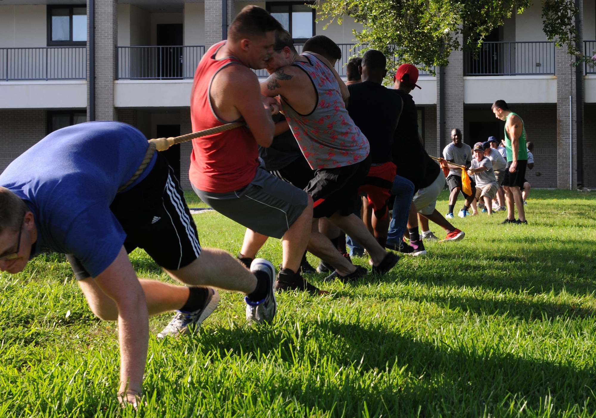 Keesler dorm residents and chief master sergeants play tug-of-war during the 2017 Dorm Bash at the Biloxi Hall courtyard August 1, 2017, on Keesler Air Force Base, Miss. The Dorm Bash was sponsored by the Keesler Chiefs Group to provide an opportunity for Keesler dorm residents to spend time together in fellowship. The chief master sergeants took home the Battle of the Bash Dragon award. (U.S. Air Force photo by Airman 1st Class Suzanna Plotnikov)