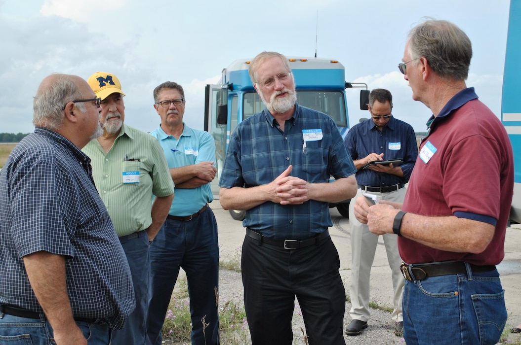 Bob Delaney, an environmental quality specialist with the Michigan Department of Environmental Quality, talks to fellow members of the Wurtsmith Restoration Advisory Board.