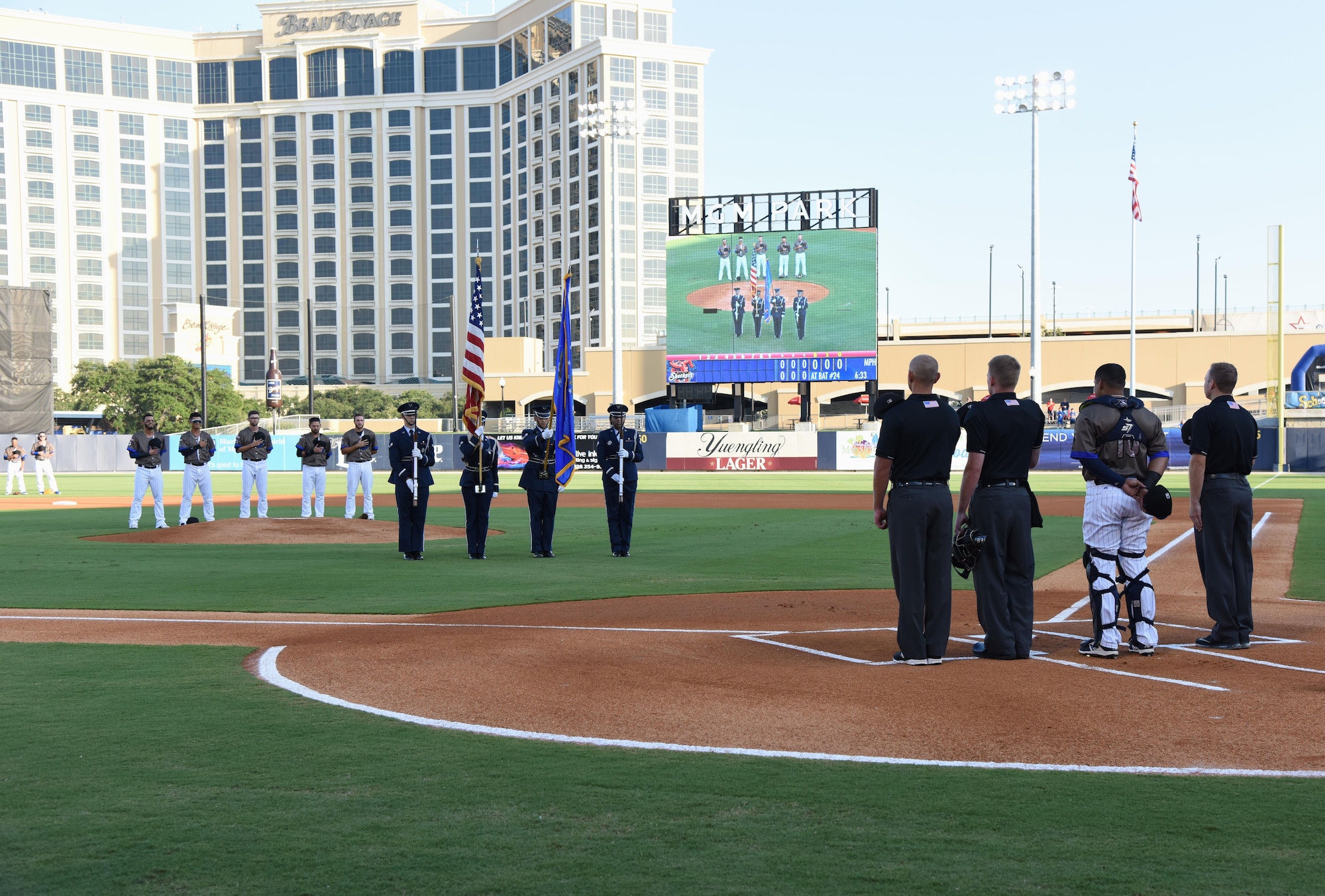 Keesler Air Force Base Honor Guard members present the colors during the Biloxi Shuckers Minor League Baseball team’s military appreciation night July 31, 2017, in Biloxi, Miss. The Shuckers recognized and honored service members and their families for serving the nation. (U.S. Air Force photo by Kemberly Groue)