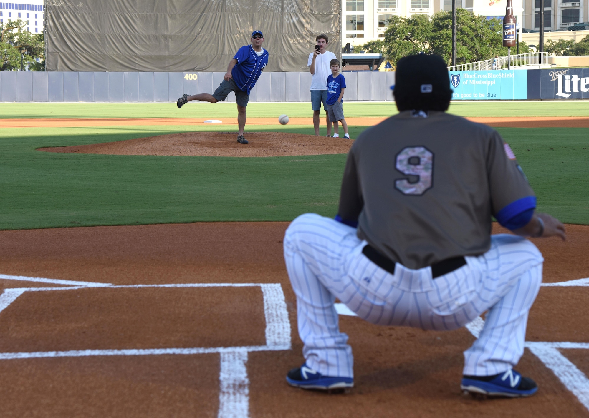 Lt. Col. Jerry Hambright, 81st Communications Squadron commander, throws the first pitch during the Biloxi Shuckers Minor League Baseball team’s military appreciation night July 31, 2017, in Biloxi, Miss. The Shuckers recognized and honored service members and their families for serving the nation. (U.S. Air Force photo by Kemberly Groue)