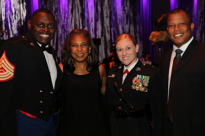 Master Sgt. Damian Cason, Dr. Eve Hall, Maj. Nicole Bastian and Venton Blandin (pictured left to right) pose for a photo at the Whitney M. Young, Jr. Awards Gala in St. Louis, Mo., on July 28, 2017. The theme of this year’s National Urban League National Conference was “Save Our Cities: Education, Jobs and Justice.” (U.S. Marine Corps photo by Sgt. Jennifer Webster/Released)