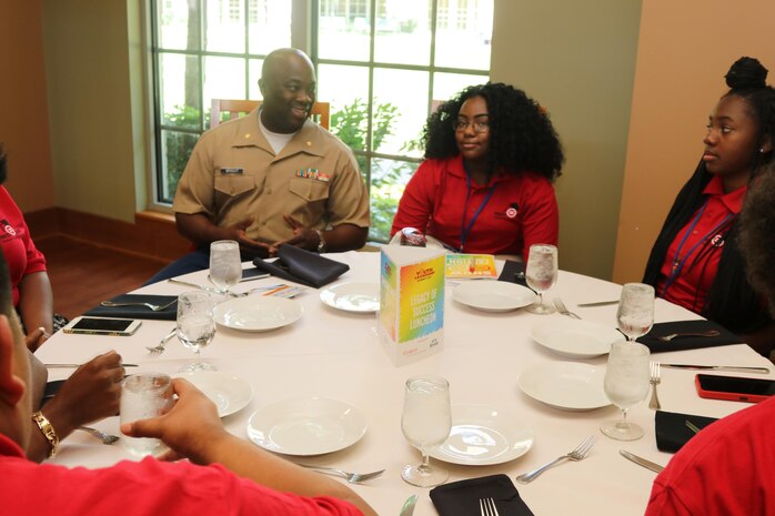 Marines with Marine Corps Recruiting Command and Recruiting Station St. Louis interact and engage with students at the Youth Legacy of Success Luncheon and Awards Ceremony during the National Urban League Youth Leadership Summit in St. Louis on July 29, 2017. The theme for this year’s Youth Summit was “Show Me: Turn Talk Into Action.” (U.S. Marine Corps photo by Sgt. Jennifer Webster/Released)