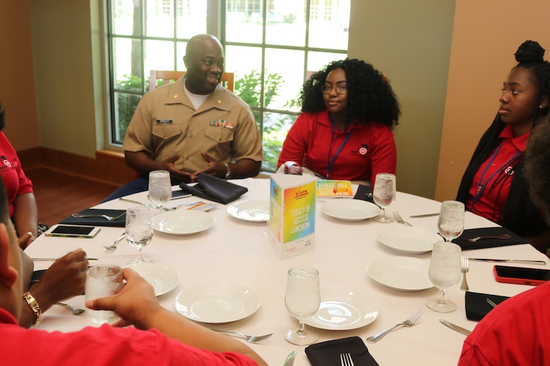 Marines with Marine Corps Recruiting Command and Recruiting Station St. Louis interact and engage with students at the Youth Legacy of Success Luncheon and Awards Ceremony during the National Urban League Youth Leadership Summit in St. Louis on July 29, 2017. The theme for this year’s Youth Summit was “Show Me: Turn Talk Into Action.” (U.S. Marine Corps photo by Sgt. Jennifer Webster/Released)