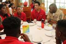 Marines with Marine Corps Recruiting Command and Recruiting Station St. Louis interact and engage with students at the Youth Legacy of Success Luncheon and Awards Ceremony during the National Urban League Youth Leadership Summit in St. Louis on July 29, 2017. The theme for this year’s Youth Summit was “Show Me: Turn Talk Into Action.” (U.S. Marine Corps photo by Sgt. Jennifer Webster/Released)