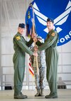 Lt. Col. Mark Sletten, 8th Fighter Squadron commander, is presented command of the 8th FS by Col. James Keen, 54th Fighter Group commander, during an activation ceremony at Holloman Air Force Base, N.M. Aug. 4, 2017. The 8th FS has been reactivated six years after its last inactivation May 13, 2011. The 8th FS, which was first activated at Selfridge Field, Mich., Jan. 16, 1941, as part of the 49th Pursuit Group, has maintained and piloted various styles of aircraft under an ever-evolving mission. (U.S. Air Force photo by Airman 1st Class Alexis P. Docherty)