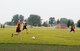 Members of the 90th Operations Group soccer team drive the ball down the soccer field while playing against the 90th Logistics Readiness Squadron team during the annual Frontiercade soccer competition at F.E. Warren Air Force Base, Wyo., Aug. 4, 2017. Frontiercade is an event held yearly on base to promote friendly competition amongst the units of the 90th Missile Wing. (U.S. Air Force photo by Staff Sgt. Christopher Ruano)