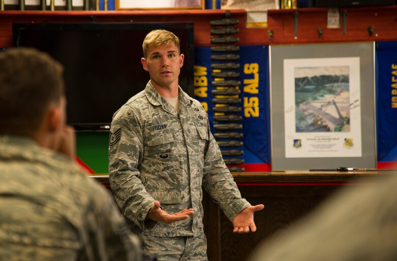 Tech. Sgt. Jarred Fischer, 25th Air Support Operations Squadron, teaches Security Forces members from the Pacific about Theater Air Control Systems and Army Air Ground Systems during a week-long close air support familiarization course, Schofield Barracks, Hawaii, July 31, 2017. The course is designed to help increase base defense capabilities by training Security Forces Airmen to call in 9-lines for close air support at their local installations. (U.S. Air Force photo by Tech. Sgt. Heather Redman)