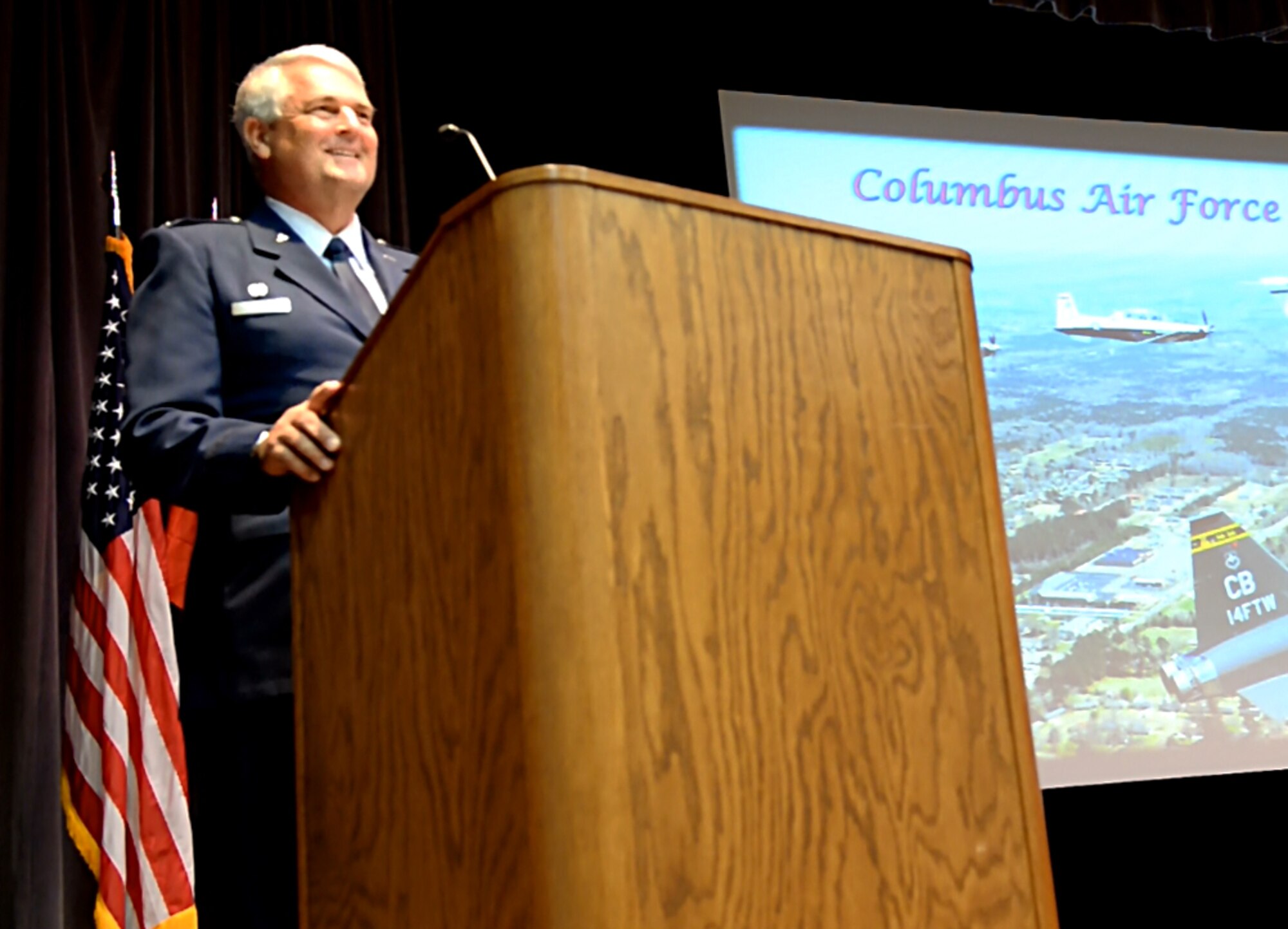 Retired Col. Michael Speer, former 315th Airlift Wing Vice Wing Commander, gave advice to Specialized Undergraduate Pilot Training Class 17-12 about what is to come in their next journey of being an Air Force pilot July 28, 2017 at Columbus Air Force Base, Mississippi. Speer’s son, Capt. Michael Speer, earned his wings that day along with his wingmen. (U.S. Air Force photo by Airman 1st Class Keith Holcomb