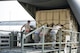 Military personnel help load a C-17 Globemaster III during a Mobility Guardian Aeromedical Evacuation exercise mission  Aug. 3. Mobility Guardian is a new exercise intended to enhance Mobility partnerships and test the full spectrum of capabilities AMC provides the nation. (U.S. Air Force photo by Staff Sgt. Daniel Liddicoet)
