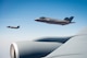 Two F-35A Lighting IIs assigned to the 62nd Fighter Squadron, Luke Air Force Base Ariz, fly near an Arizona National Guard KC-135 Stratotanker Aug. 4, 2017. Four F-35’s participated in a missing man formation fly-over during WWII pilot 2nd Lt. Charles E. Carlson’s funeral in Pennsylvania more than 70 years after being shot down over Germany in World War II when he was assigned to the 62 FS. (U.S. Air Force photo/Staff Sgt. Jensen Stidham)