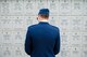 1st Lt. Matt Brown, 62nd Fighter Squadron pilot, looks at the name of deceased service members at the Indiantown Gap National Cemetery in Annville, Penn., Aug. 4, 2017. Before attending the funeral of former 62nd FS 2nd Lt. Charles E. Carlson, several Airmen reflected upon the thousands of gravesites. (U.S. Air Force photo/Staff Sgt. Jensen Stidham)