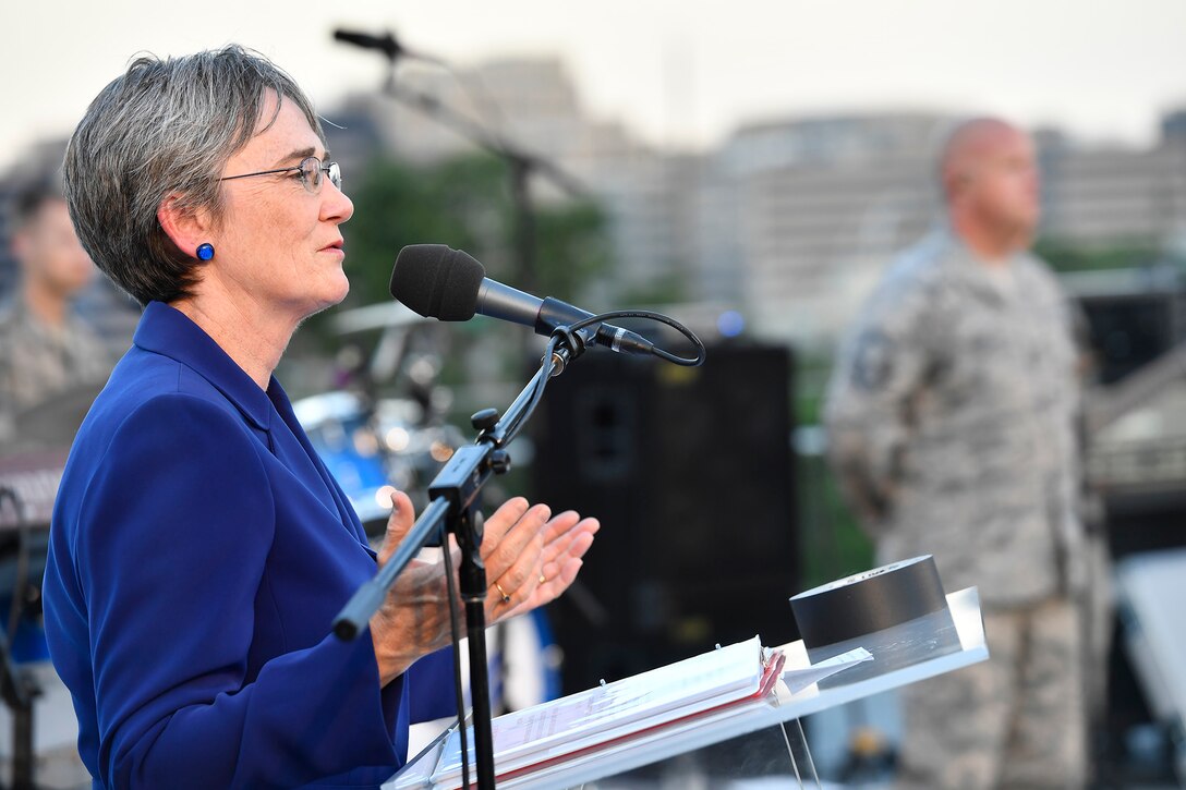 Secretary of the Air Force Heather Wilson honors Portraits in Courage Airmen during the final 2017 Heritage to Horizons summer concert series, performed by the Air Force Band in Arlington, Va., Aug. 4, 2017.  (U.S Air Force photo/Scott M. Ash)