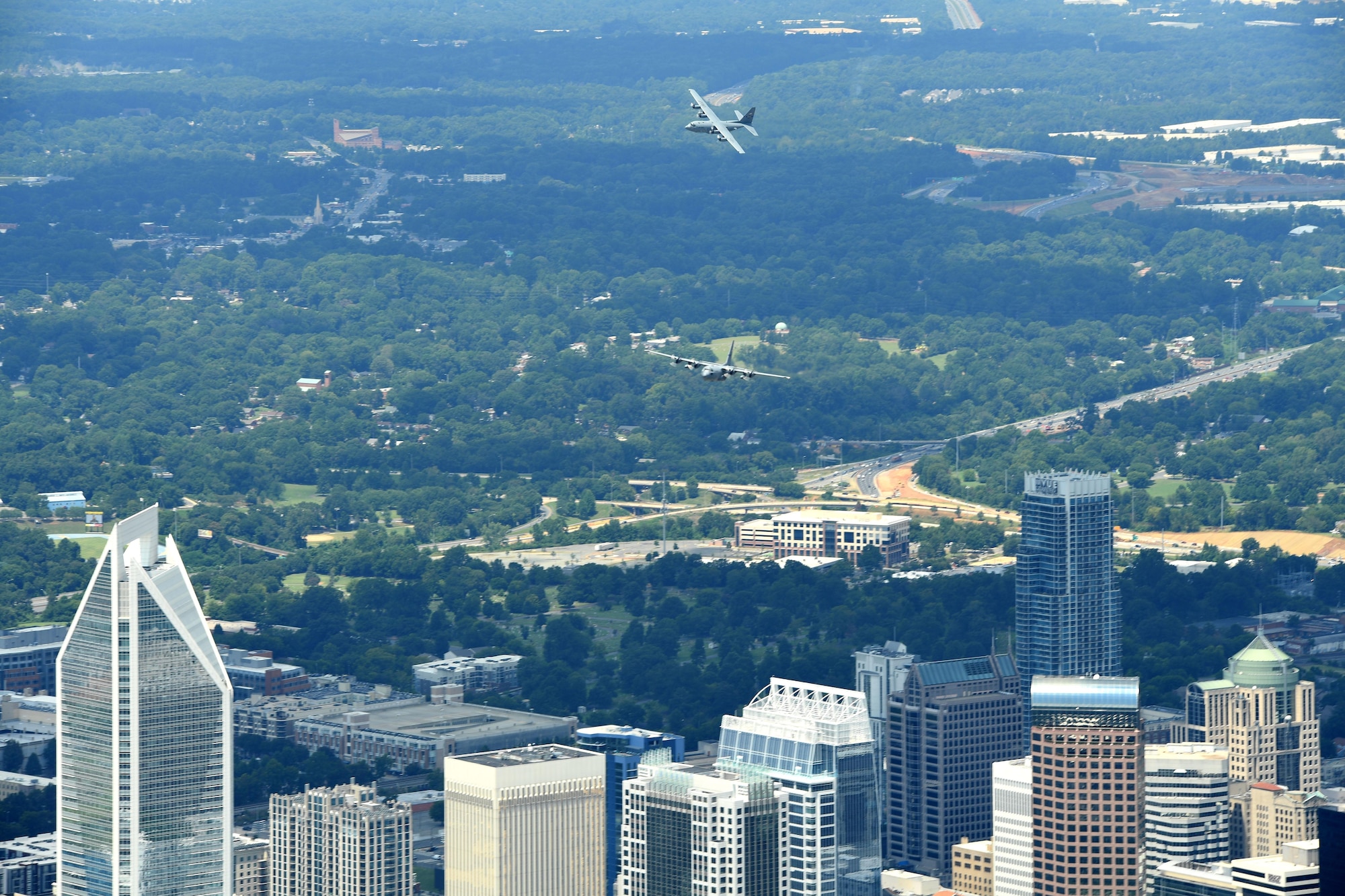 C-130 Aircraft fly above the city of Charlotte