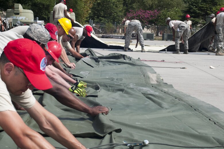 The 567th Rapid Engineer Deployable Heavy Operational Repair Squadron Engineers conducted BEAR BASE contingency and Expedient Airfield Repair training here on Aug 4-5, 2017. (U.S. Air Force photo/Senior Airman Jeramy Moore)