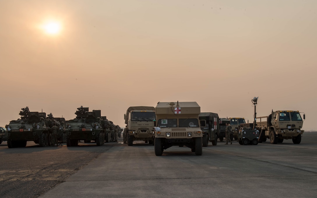 armored vehicles on flightline