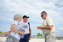 Tech. Sgt. Ed Stapp, 434gh Aircraft Maintenance Squadron crew chief, speaks with visitors Jim Alvis, 71st Special Operations Squadron member, and his wife Judi at Grissom Air Reserve Base, Ind., July 21, 2017. The group had the opportunity to view the inside and outside of the aircraft as part of their tour. (U.S Air Force photo/Senior Airman Cali Wetli)