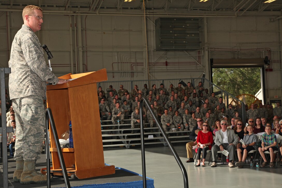 Col. Frank “Les” Bradfield III speaks to the audience.
