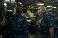 U.S. Navy Vice Adm. Charles Richard (right), deputy commander of U.S. Strategic Command (USSTRATCOM), tours USS Alaska (SSBN 732) during his visit to Naval Submarine Base Kings Bay, Ga., Aug. 3, 2017. While there, Richard presented the 2016 Omaha Trophy, ballistic missile submarine category, to leaders and crew members of USS Alaska in recognition of their contributions to strategic deterrence. The Omaha Trophy, which dates back to the U.S. Air Force's Strategic Air Command, was originally created by the Strategic Command Consultation Committee in 1971. At the time, a single trophy was presented the organization’s best wing. The tradition later evolved to five awards that recognize USSTRATCOM’s premier intercontinental ballistic missile wing, ballistic missile submarine, strategic bomber wing, global operations (space/cyberspace) unit and strategic aircraft wing.