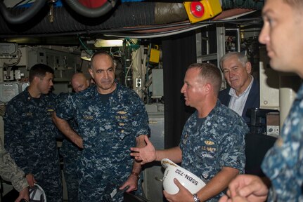 U.S. Navy Vice Adm. Charles Richard (center left), deputy commander of U.S. Strategic Command (USSTRATCOM), and retired U.S. Air Force Lt. Gen. Robert Hinson (second from right), Strategic Command Consultation (SCC) Committee representative, tour USS Alaska (SSBN 732) during their visit to Naval Submarine Base Kings Bay, Ga., Aug. 3, 2017. While there, Richard and Hinson presented the 2016 Omaha Trophy, ballistic missile submarine category, to leaders and crew members of USS Alaska in recognition of their contributions to strategic deterrence. The Omaha Trophy, which dates back to the U.S. Air Force's Strategic Air Command, was originally created by the SCC in 1971. At the time, a single trophy was presented the organization’s best wing. The tradition later evolved to five awards that recognize USSTRATCOM’s premier intercontinental ballistic missile wing, ballistic missile submarine, strategic bomber wing, global operations (space/cyberspace) unit and strategic aircraft wing.