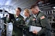 The 932nd Airlift Wing's Aeromedical Evacuation Squadron had a busy training weekend recently.  From left to right, Staff Sgt. Samantha Strom, 2nd Lt. Liz Erdman, and Airman 1st Class Nathan Boyer go over a preflight checklist of medical items as they prepare to load their patient equipment aboard a waiting C-17 aircraft on July 29, 2017, at Scott Air Force Base, Illinois.  They flew a multiple day mission to get experience in the air and on the ground loading and offloading procedures.  (U.S. Air Force photo by Lt. Col. Stan Paregien)