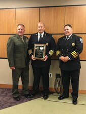Major General Broadmeadow presents the Medium Fire Department of the year to, Fire Chief Sullivan and Taormina, for the second time in a row. Outstanding job to the firefighters in Security Battalion.