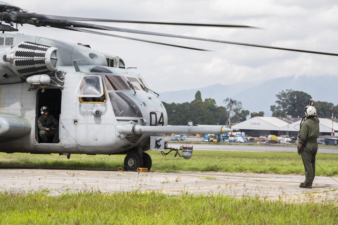 U.S. Marines prepare their CH-53E Super Stallion helicopter for takeoff from La Aurora International Airport in Guatemala City, Guatemala, Aug. 1, 2017.