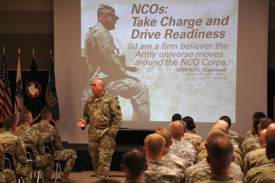 Command Sgt. Maj. Ted. L. Copeland, command sergeant major of the Army Reserve, talks with Soldiers during a town hall meeting July 12, 2017, at the Staff Sgt. Todd R. Cornell Noncommissioned Officer Academy at Fort McCoy, Wis.