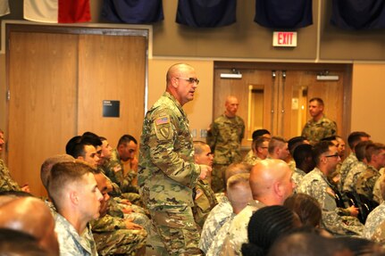 Command Sgt. Maj. Ted. L. Copeland, command sergeant major of the Army Reserve, talks with Soldiers during a town hall meeting July 12, 2017, at the Staff Sgt. Todd R. Cornell Noncommissioned Officer Academy at Fort McCoy, Wis.