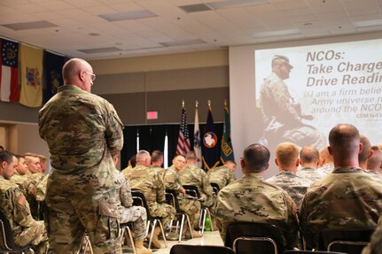 Command Sgt. Maj. Ted. L. Copeland, command sergeant major of the Army Reserve, talks with Soldiers during a town hall meeting July 12, 2017, at the Staff Sgt. Todd R. Cornell Noncommissioned Officer Academy at Fort McCoy, Wis.