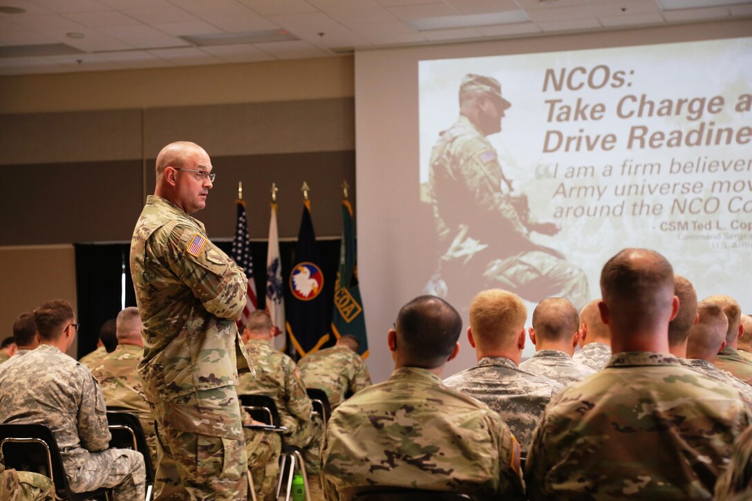 Command Sgt. Maj. Ted. L. Copeland, command sergeant major of the Army Reserve, talks with Soldiers during a town hall meeting July 12, 2017, at the Staff Sgt. Todd R. Cornell Noncommissioned Officer Academy at Fort McCoy, Wis.