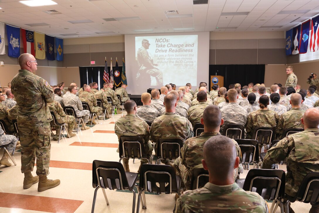 Command Sgt. Maj. Ted. L. Copeland, command sergeant major of the Army Reserve, talks with Soldiers during a town hall meeting July 12, 2017, at the Staff Sgt. Todd R. Cornell Noncommissioned Officer Academy at Fort McCoy, Wis.