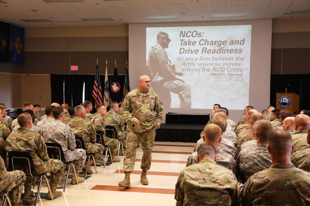 Command Sgt. Maj. Ted. L. Copeland, command sergeant major of the Army Reserve, talks with Soldiers during a town hall meeting July 12, 2017, at the Staff Sgt. Todd R. Cornell Noncommissioned Officer Academy at Fort McCoy, Wis.