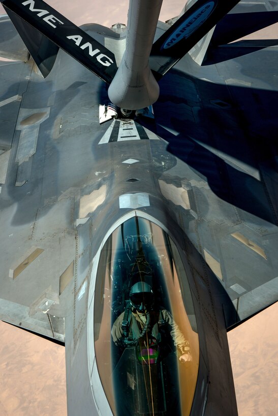 An Air Force F-22 Raptor receives fuel.