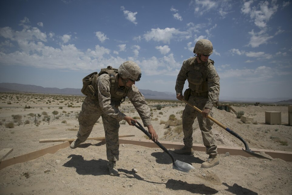 Marines with the engineer platoon for Marine Wing Support Squadron 272, construct an observation post aboard the Combat Center during Integrated Training Exercise 5-17, July 29, 2017. MWSS-272 is supporting the Aviation Combat Element of the ITX. The ACE conducts offensive, defensive, and all other air operations to support the MAGTF mission . (U.S. Marine Corps photo by Cpl. Medina Ayala-Lo)
