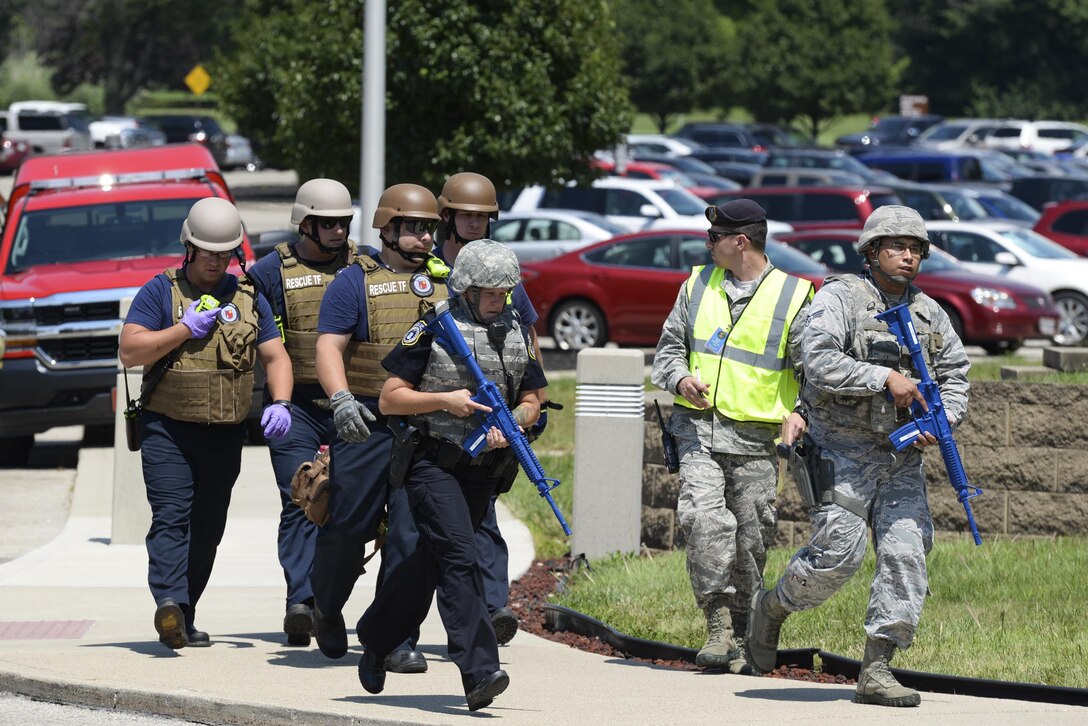 Security Forces escorting medics