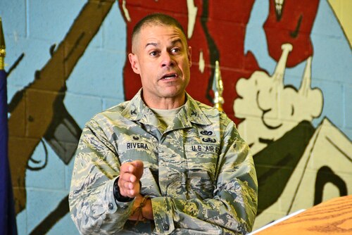 819th RED HORSE Squadron Commander Col. Jose Rivera-Hernandez speaks during the 20th anniversary celebration recognizing the reactivation of the active duty United States Air Force 819th RHS and the activation of the 219th RED HORSE Squadron of the Montana Air National Guard in the Airfields Building at Malmstrom Air Force Base, Mont. July 20, 2017.