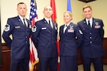 Master Sgt. Christopher, Master Sgt. Raymond, Tech Sgt. Courtney, and Staff Sgt. Matthew pose for a group photo after graduation from Remotely Piloted Aircraft Training at Joint Base San Antonio - Randolph.