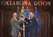 Col. Robert A. Kielty received the guidon from 448th Supply Chain Management Wing director Frank Washburn, as he assumed command of the 848th Supply Chain Management Group. Kielty joins the group from 500 yards down the hall in Bldg. 3001, as the former Executive Officer for Air Force Sustainment Center Commander Lt. Gen. Lee K. Levy II. (Air Force photo by Jillian Coleman)