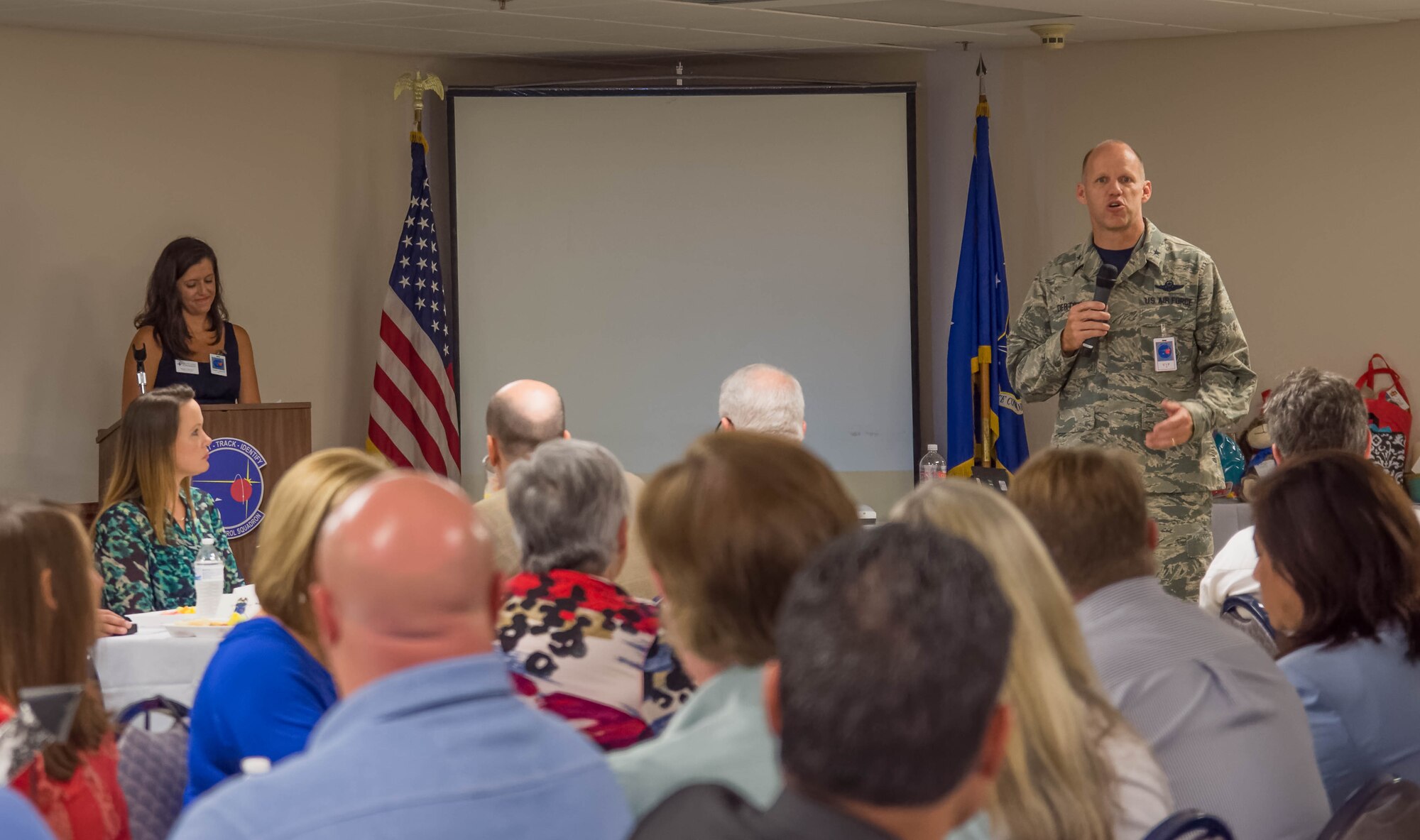 Brigadier General Evan Dertien, 96th Test Wing commander, welcomes attendees and thanks the community for their continuous support at the Walton County Chamber of Commerce First Friday Breakfast.