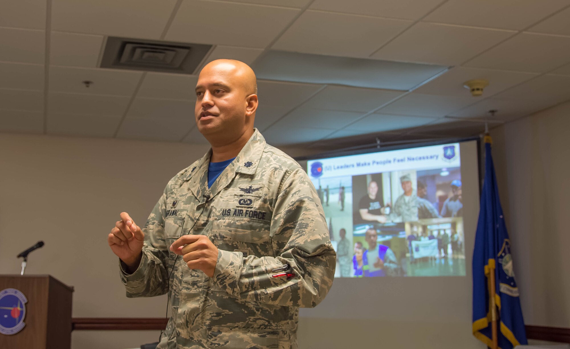 Lieutenant Colonel Raj Agrawal, 20th Space Control Squadron commander and guest speaker, briefs leadership principles and the 20th SPCS mission at the Walton County Chamber of Commerce First Friday Breakfast.