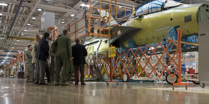 Airmen from Mountain Home Air Force Base, Idaho, tour a defense contractor's factory during a visit to St. Louis, Aug. 3, 2017. The tour showed the production of an F-15E Strike Eagle from start to finish. (U.S. Air Force photo/Senior Airman Jeremy L. Mosier)