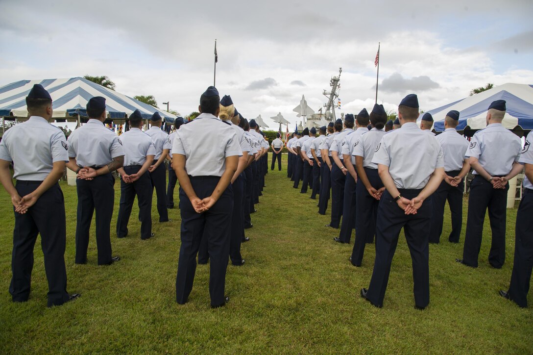 Members of the 15th Medical Group stand in formation during the 15th Medical Group’s change of command on Joint Base Pearl Harbor-Hickam, Hawaii, Aug. 1, 2017. The 15th Medical Group provides outpatient healthcare to the Hickam community and maintains operational ready forces through wellness and primary healthcare. (U.S. Air Force photo by Tech. Sgt. Heather Redman)
