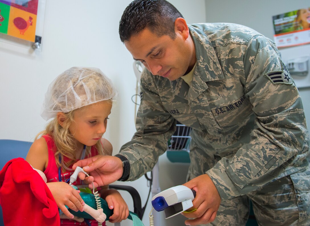 The 96th Medical Group's pediatric clinic hosted 127 children during their first Teddy Bear Clinic to educate them about hospital procedures and to demonstrate what they may expect if they need to see a doctor.