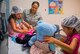 Senior Airman Antoinette Fowler, a 96th Medical Group aerospace medical services journeyman, shows four-year-old, Layla Sherwood how to give an immunization during the first Teddy Bear Clinic at Eglin Air Force Base, Aug. 4. Children took their stuffed animals and characters through eight clinic stations. Stations included registration, CPR, immunizations, nutrition, fitness and vital signs. The Pediatric Clinic hosted 127 children to educate them about hospital procedures and to demonstrate what they may expect if they need to see a doctor. (U.S. Air Force photo/Ilka Cole)