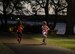 Servicemembers and their families participate in the Glow for Awareness family fun run at Joint Base Pearl Harbor-Hickam, Hawaii, Aug. 4, 2017.   The fun run was sponsored by the Hickam Sexual Assault Prevention and Response office to help bring the community together to focus on resiliency in a fun environment.  (U.S. Air Force photo by Tech. Sgt. Heather Redman)