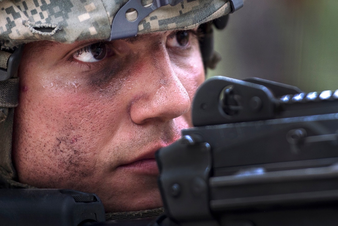 A paratrooper provides security in his sector.