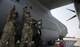 U.S. Air Force Airman 1st Class Tyler Holt, right, and Staff Sgt. George Childres, both 41st Airlift Squadron, loadmasters, walk through the process of hot defueling the C-130J Super Hercules during Exercise Mobility Guardian at Fairchild Air Force Base, Wash., Aug. 3, 2017. (U.S. Air Force photo by Tech. Sgt. Nathan Lipscomb)