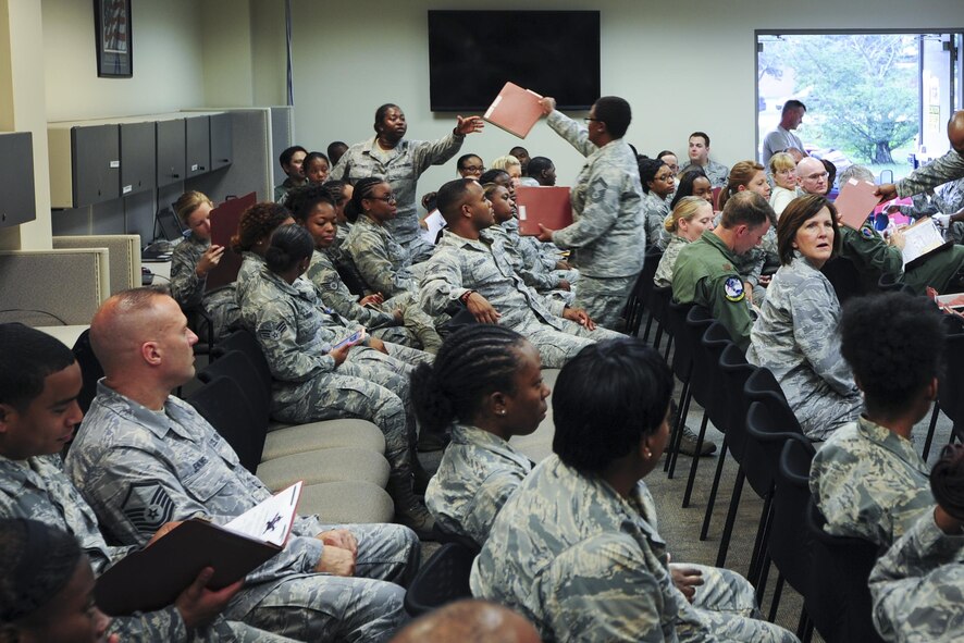 Members of the 413th Aeromedical Staging Squadron receive mobility folders Aug. 4, 2017, at Robins Air Force Base, Ga. The Airmen traveled to Dobbins Air Reserve Base, Ga., to take part in the first-ever Exercise Avian, which trained them on staging and holding patients in preparation for flight in a deployed location. (U.S. Air Force photo by Jamal D. Sutter)
